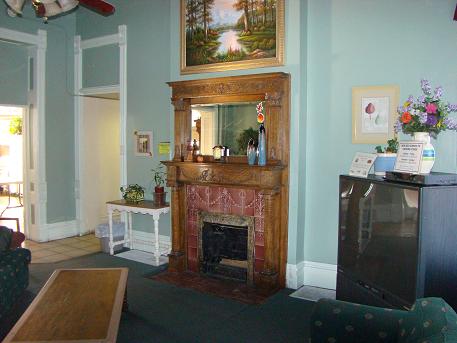 The Recently Restored Fireplace in Our TV Room